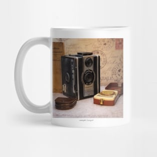 An old vintage camera with external exposure meter, as a poster Mug